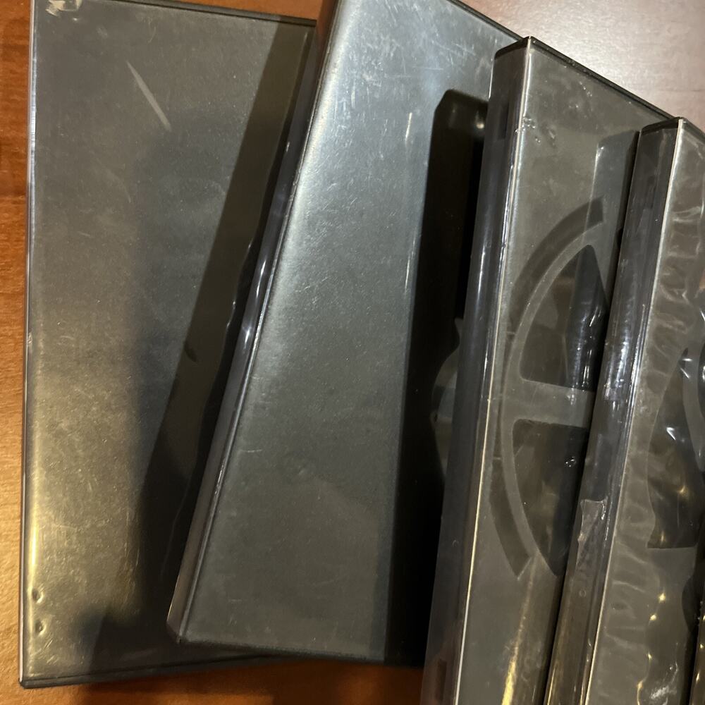 Qty = 4 Used DVD Cases. Undamaged